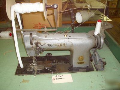 Singer industrial sewing machine used 212 W146
