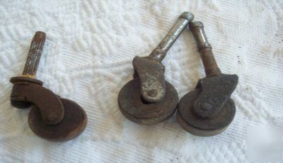 3 antique furniture casters with wooden wheels