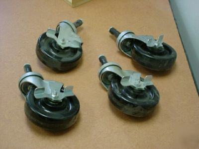 4 heavy duty locking casters w/ hard rubber wheels 