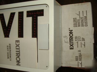 New exitronix 603U-dp-wh led emergency exit sign in box