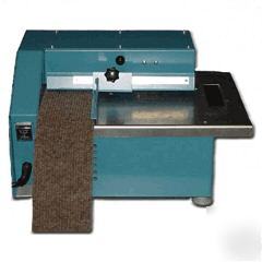 Portable carpet cove wall base strip cutting machine