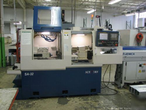 2004 ksi nexturn swiss cnc lathe SA32 w/ iemca feeder 