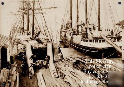 Logging-logs & lumber loaded on ship- metal photo sign