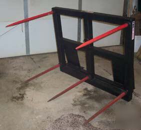 Skid steer bale spear attachment