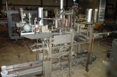 Cannon / haab case packer for gallon containers