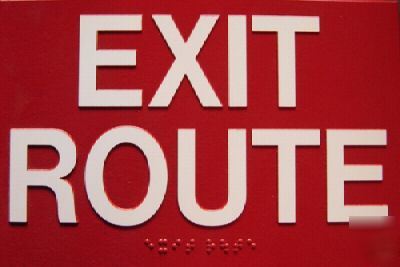 Ada exit route sign braille red white letters 9